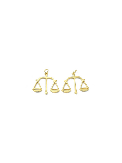 Lady. Justice Charm, front view.