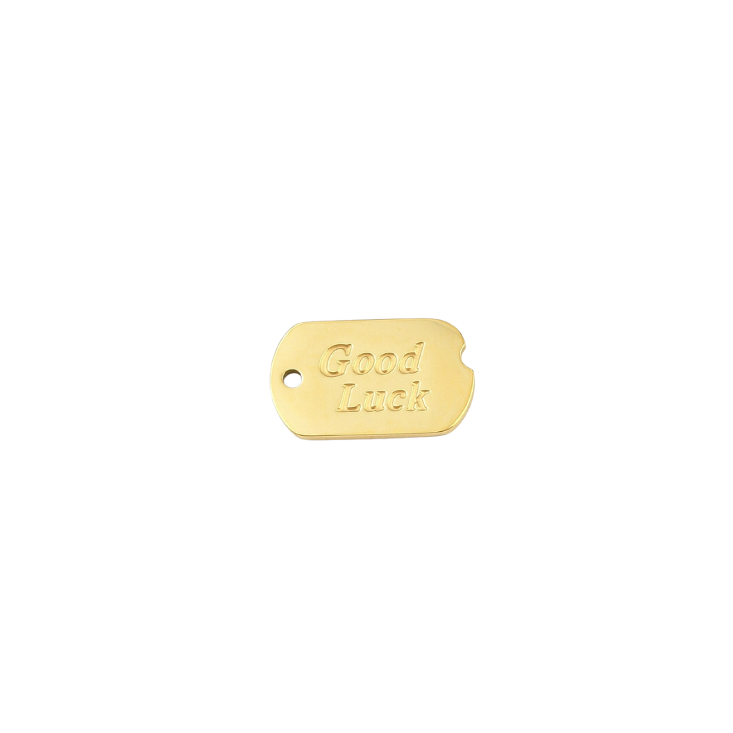 Gold Good Luck Dog Tag Charm on transparent background 