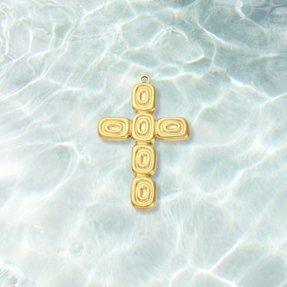 Gold Abstract Cross Charm  on water background 