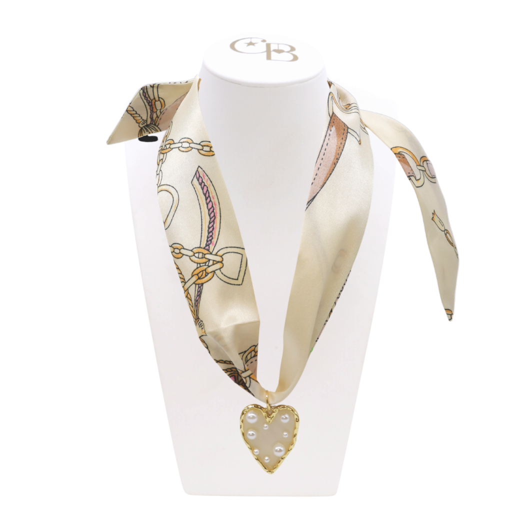 Front view of the Scarf Necklace with Gold Pearl Studded Heart Charm on CB Bust