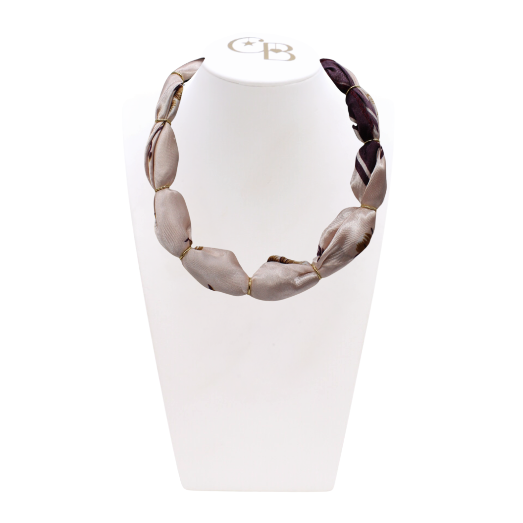 Front view of the Light Pink Thick Bubble Scarf Necklace on CB Bust