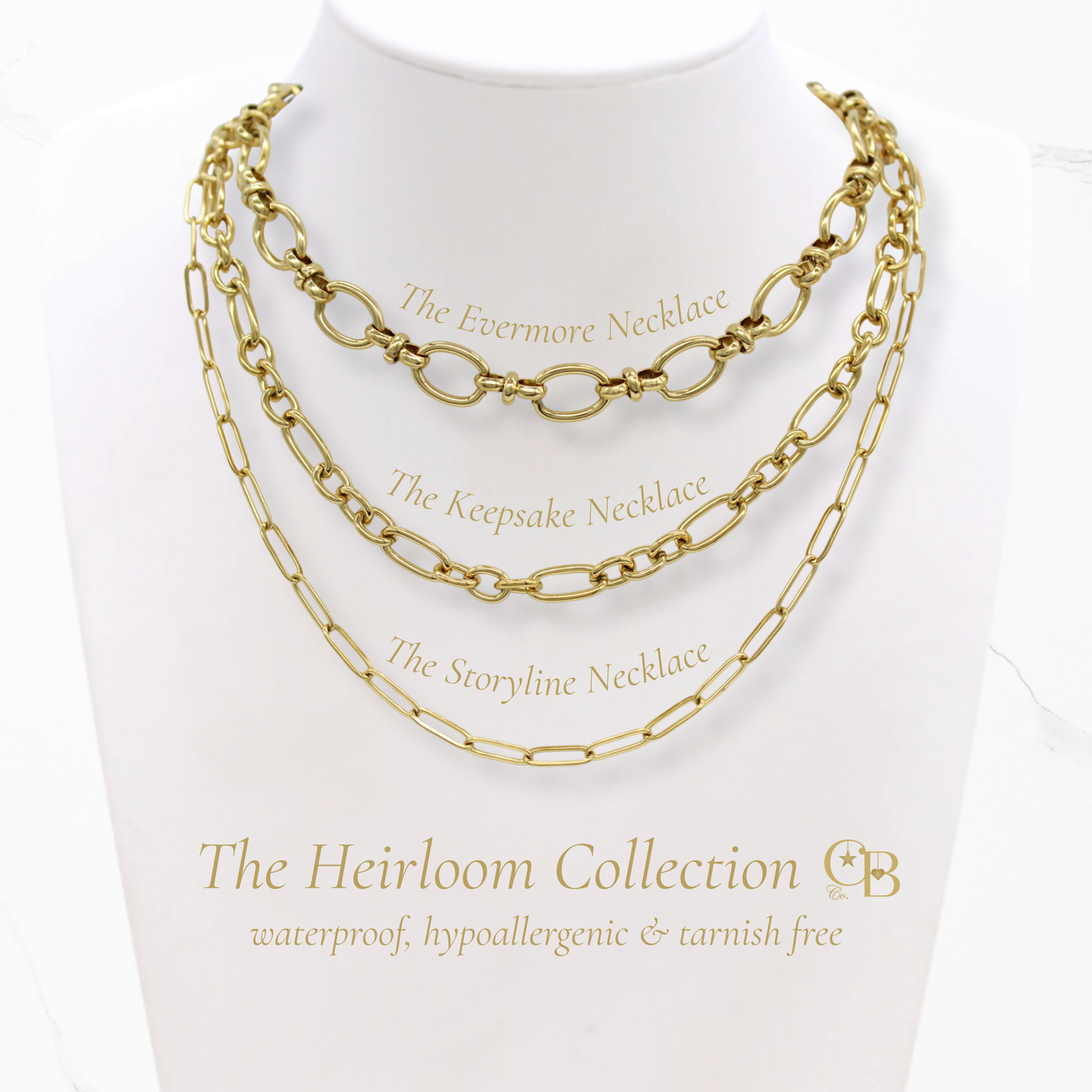 Gold chain necklaces on a mannequin with 'The Heirloom Collection' branding.