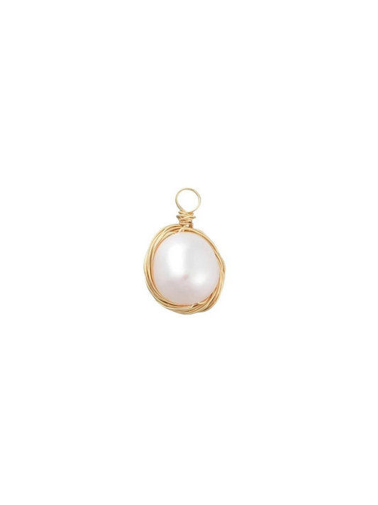 Wire wrapped baroque pearl charm on white background.
