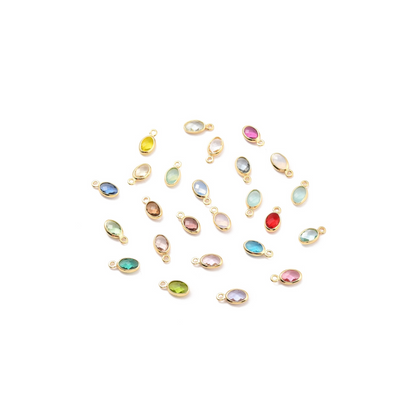 Oval Framed Glass Charms assortment, front view.