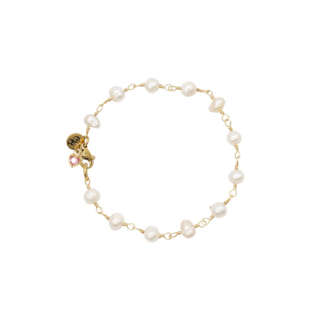 Transparent view of the Gold Beth Pearl Charm Bracelet