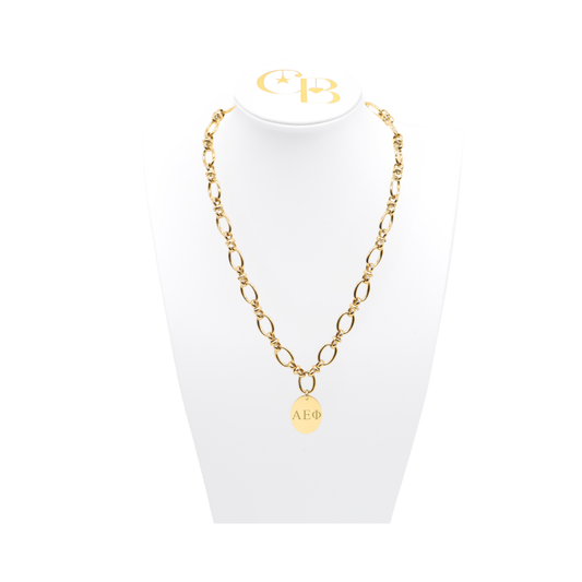 Alpha Epsilon Phi gold large link evermore necklace with large oval charm displayed on white necklace bust front view with horizontal greek letters