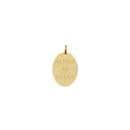 Alpha XI Delta gold small oval charm with full sorority name front view