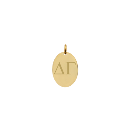 Delta Gamma gold small oval charm with horizontal greek letters front view