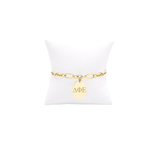 Delta Phi Epsilon gold large link keepsake bracelet with large oval charm with horizontal greek letters front view