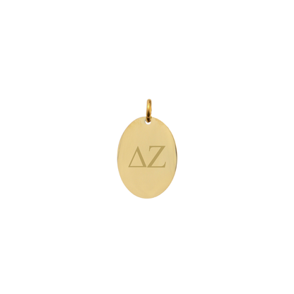 Delta Zeta gold small oval charm with horizontal greek letters front view.