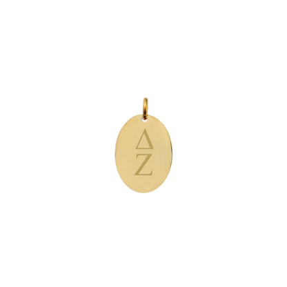 Delta Zeta gold small oval charm with vertical greek letters front view
