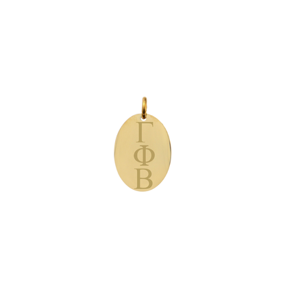 Gamma Phi Beta gold small oval charm with vertical/stacked greek letters front view