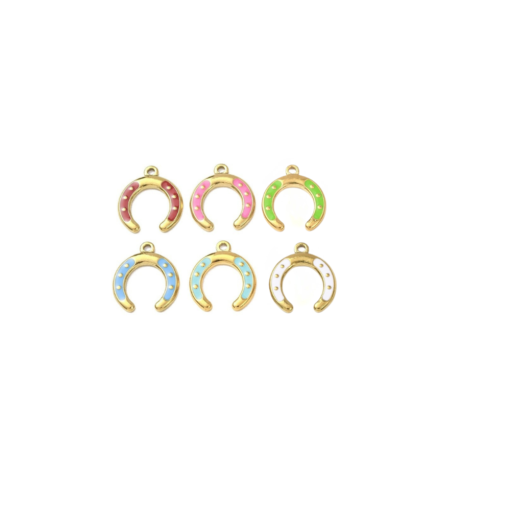 Assorted gold horseshoe charms with colorful enamel accents on a white background
