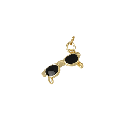 Gold sunglasses charm with glossy black enamel lenses, displayed on a transparent background.