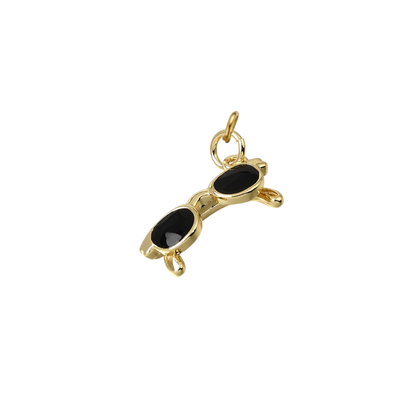 Gold sunglasses charm with glossy black enamel lenses, displayed on a white background.