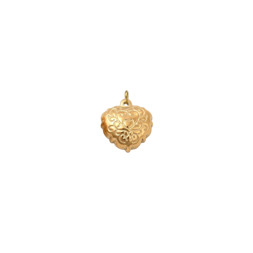 Gold filigree heart charm with an ornate engraved scrollwork design on a white background.