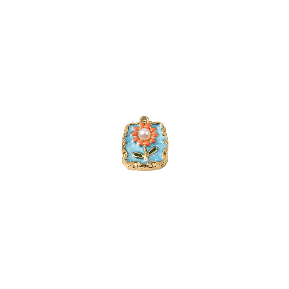 Gold square floral tile charm with pearl tile charm with blue enamel background, orange flower details and pearl center on a white background