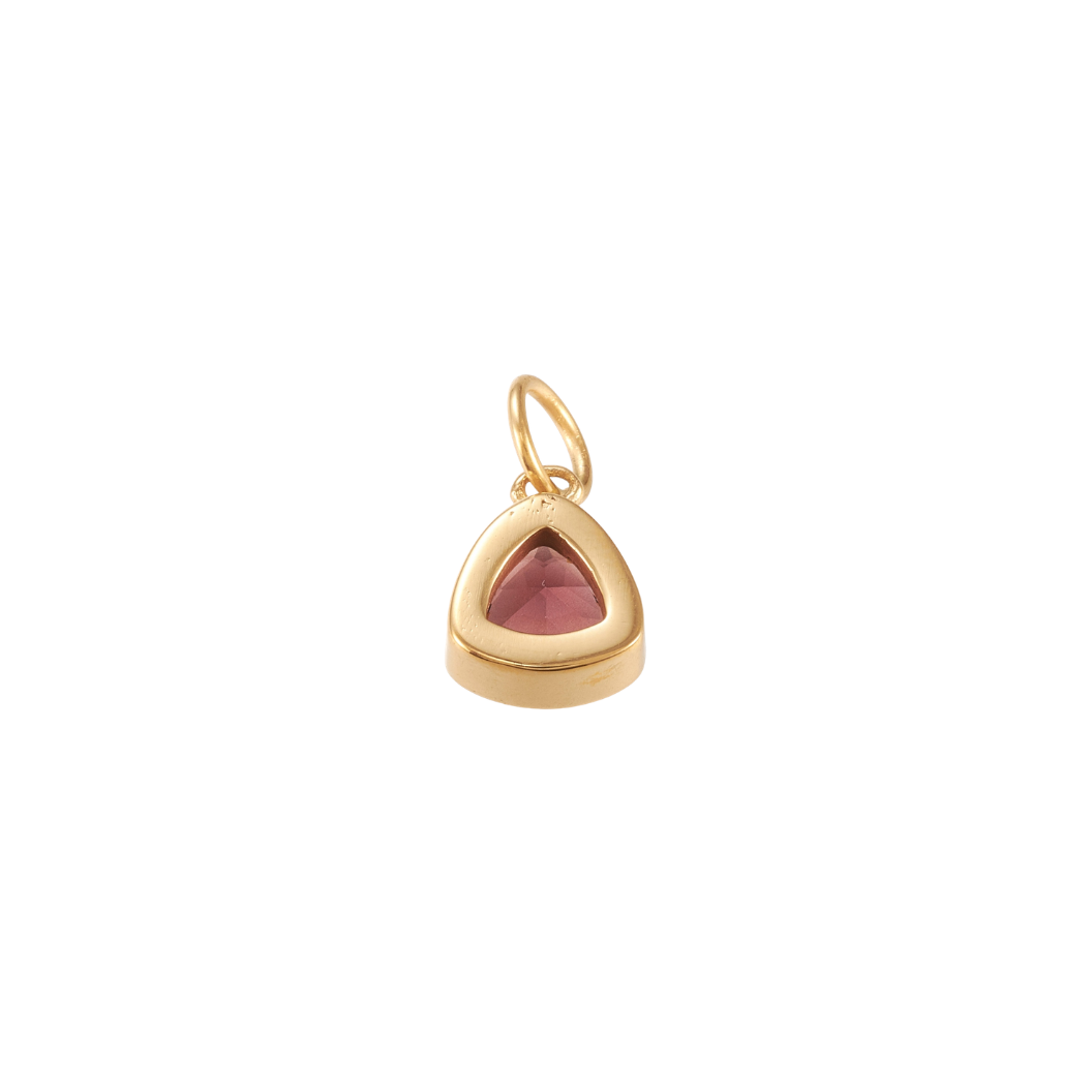 Back view of a Gold triangular charm featuring a faceted deep burgundy gemstone on a white background.