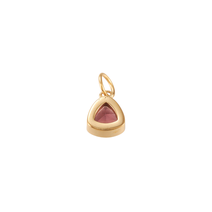 Back view of a Gold triangular charm featuring a faceted deep burgundy gemstone on a white background.