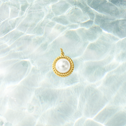 Gold pearl rope charm on a waterproof background
