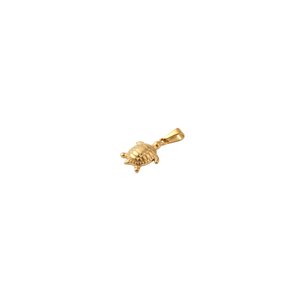 Close-up of a gold sea turtle charm with a textured shell and polished finish on a white background.
