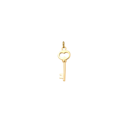 Gold skeleton key charm featuring a heart-shaped bow and polished finish on a white background.