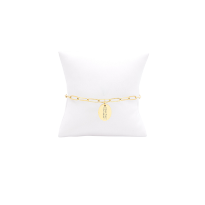 High Point University gold link storyline bracelet with small oval charm with high point university vertical text on white pillow front view
