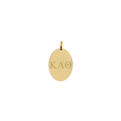 Kappa Alpha Theta gold small oval charm with horizontal greek letters front view