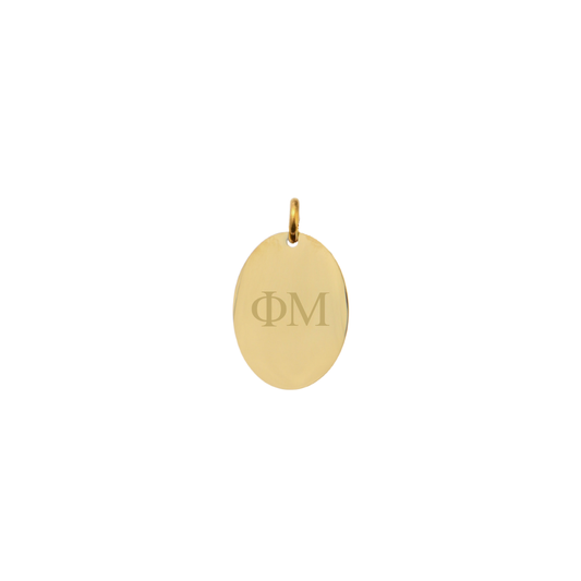Phi Mu gold small oval charm with horizontal greek letters front view.