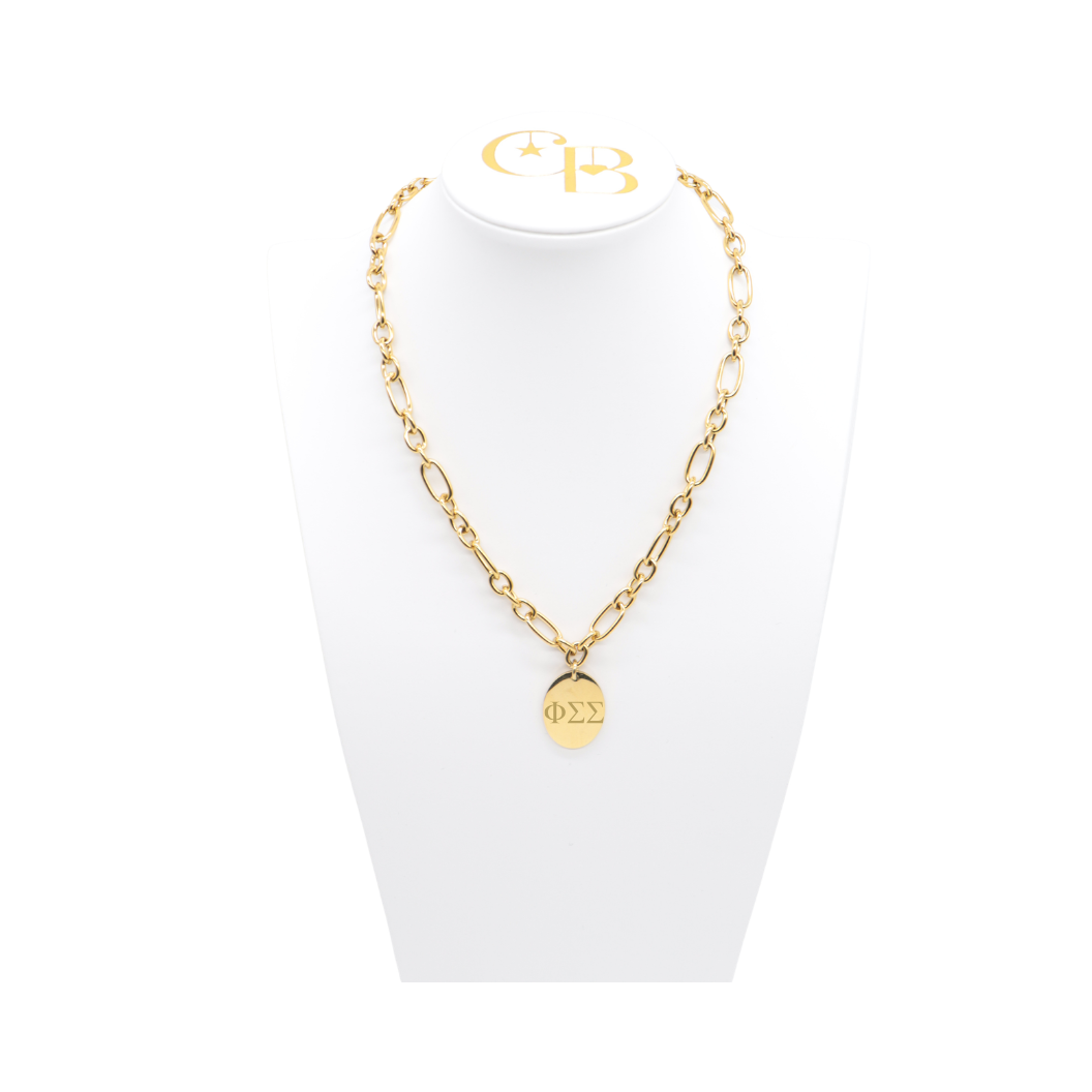 Phi Sigma Sigma gold large link keepsake necklace with large oval charm displayed on white necklace bust front view with horizontal greek letters