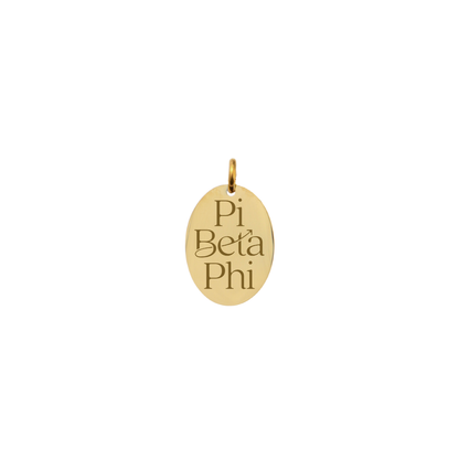 Pi Beta Phi gold small oval charm with new stacked logo front view