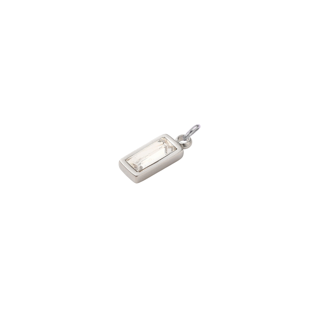 Side view of a silver rectangular clear crystal gemstone charm with a faceted baguette-cut stone on a clean white background.