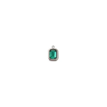Silver rectangle charm featuring a faceted teal gemstone on a white background.