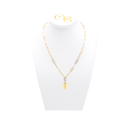 Theta Phi Alpha gold link storyline necklace with small oval charm displayed on white necklace bust front view with vertical/stacked greek letters