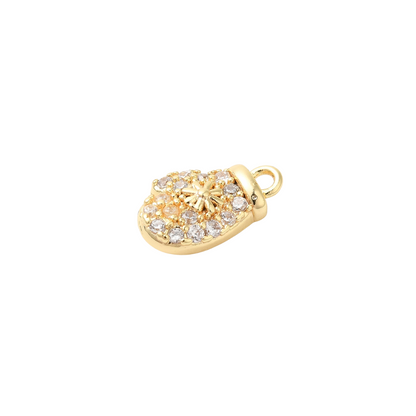 Side view of the Gold Cubic Zirconia Snowflake Mitten Charm
