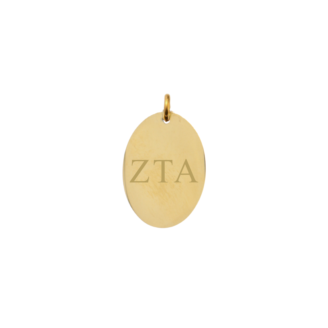 Zeta Tau Alpha gold large oval charm with horizontal greek letters front view.
